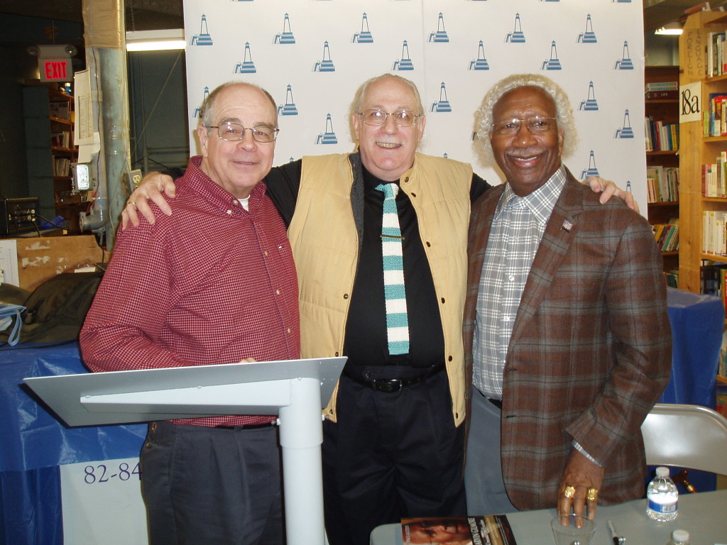 Paul (center) at his reading-signing at New England Mobile Book Fair, in Newton, with store owner Tom Lyons (left) and Marvin (right)